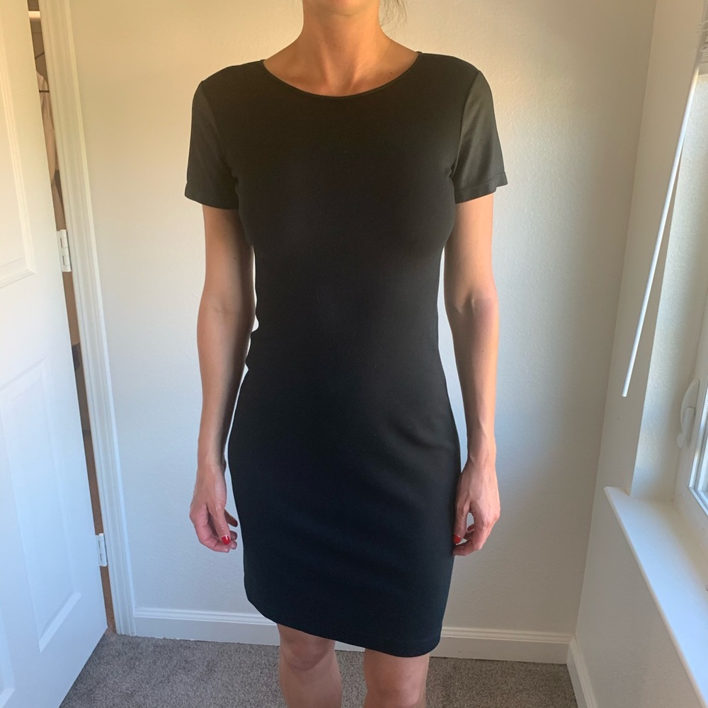 Black tshirt dress with leather sleeves and side accents